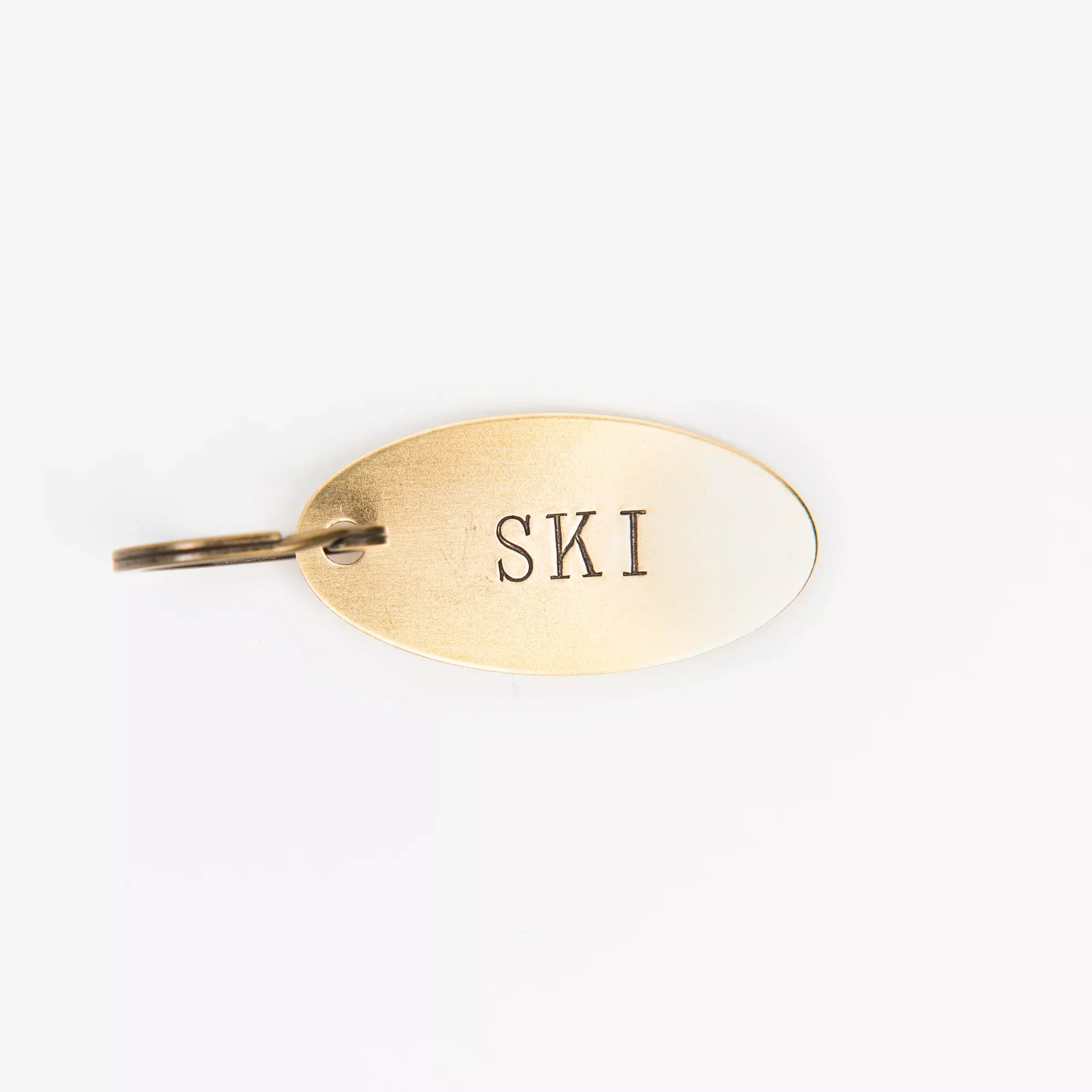 SKI Oval Brass Key Ring